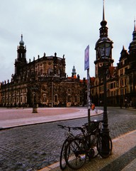 Dresden old town square on cloudly weather with bike. Germany architecture