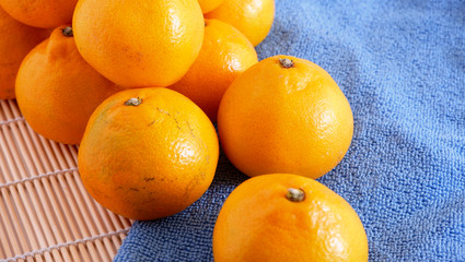 Background of juicy tangerine fruits. Fruit. Backgrounds