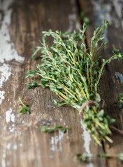 Close up view of thyme bunch. Herb thyme on table