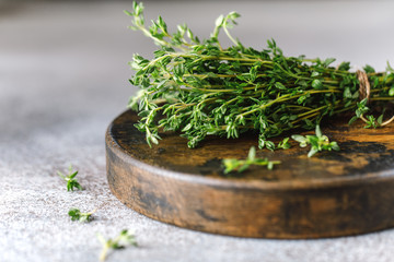 Close up view of thyme bunch. Herb thyme on table