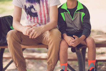 boys with hands crossed