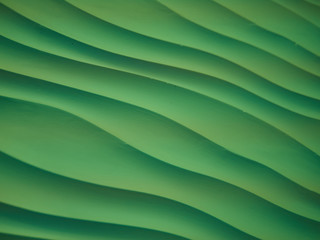 Composite green waved background. green waved pattern close up