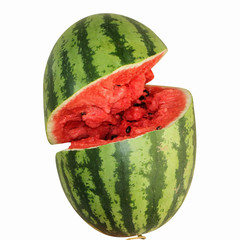 Watermelon with cracks on a white background isolated close up