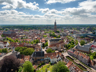 Panoramic aerial of the city center of Amersfoort, the Netherlands, on a sunny day with white clouds