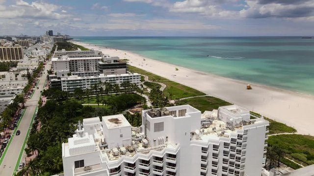 Aerial reveal clean empty beaches Miami 4k 60p