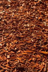 bright red cedar wood chip garden mulch