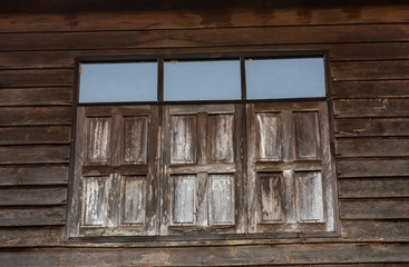 Naklejka na ściany i meble old wooden window with shutters