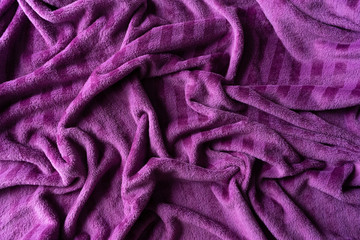 Texture purple velvet fabric close up A