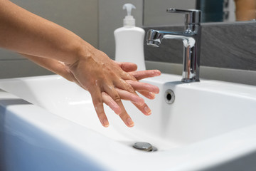 Washing hands rubbing with soap woman for corona virus prevention, hygiene to stop spreading coronavirus