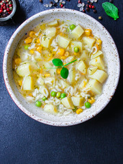 soup vegetables and pasta alphabet, peas, corn Menu concept healthy eating. food background top view copy space for text healthy eating table setting keto or paleo diet organic 