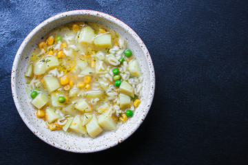 soup vegetables and pasta alphabet, peas, corn Menu concept healthy eating. food background top view copy space for text healthy eating table setting keto or paleo diet organic 