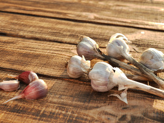 Organic garlic on wooden background. Immunity improves Vegetables