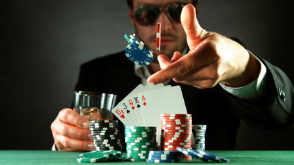 Poker player throwing chips