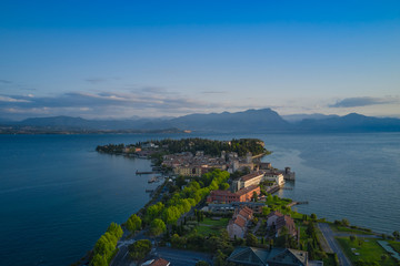 Sirmione city, Italy. Lake Garda. Early morning aerial view
