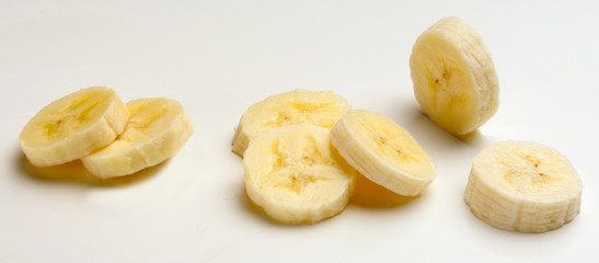 Study of Banana Slices against white background