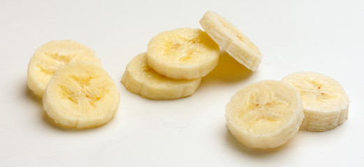 Study of Banana Slices against white background