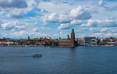 Fototapeta premium Scenic summer view of the City Hall castle in the Old Town Gamla Stan in Stockholm, Sweden. August 2018