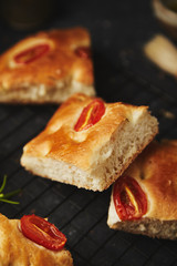 Italian pastries with cherry tomatoes and spicy herbs  -focaccia