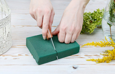How to make modern table's centerpiece for summer wedding. A lot of greenery being composed into...