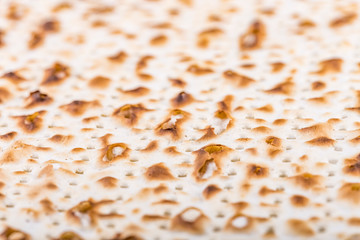 Texture of jewish passover matzah (unleavened bread). Symbol of jewish passover. Jewish bread matzo background, top view