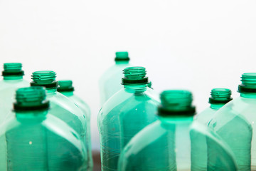 Close up of green plastic water bottles. Household recycling