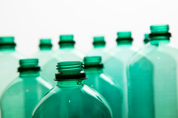 Close up of green plastic water bottles. Household recycling
