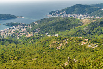 Fototapeta na wymiar Sunny aerial panoramic view of old town of Budva and Riviera, Montenegro.