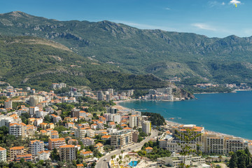 Fototapeta na wymiar Sunny aerial panoramic view of old town of Budva and Riviera, Montenegro.