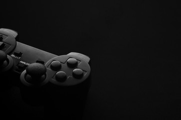 Black and white photo of the gamepad, there is a place for text © Polani