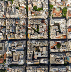 Aerial top down view of streets and buildings pattern in Athens, Greece