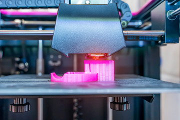 3D printer or additive manufacturing and robotic automation technology.