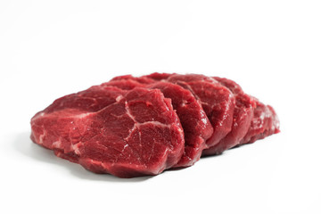 Freshness raw beef in pieces with white background.