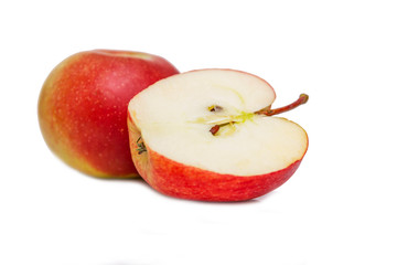 Red apples on isolated on a white background. Healthy nutrition and vitamins. Close-up.