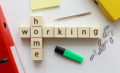 Wooden cubes with word on the office desk.