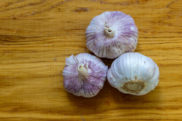 Whole and slices of garlic. Healthy vegetable