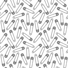 Vector hand drawn safety pins seamless pattern. Cute sewing illustration on white background. Ideal for wallpaper, textile, scrapbook.
