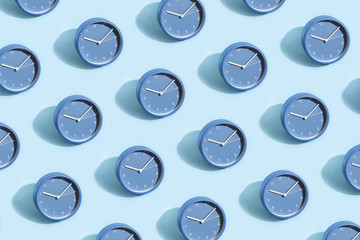 Pattern made of blue clock.