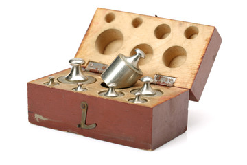 Set of a vintage weights for a old balance scale