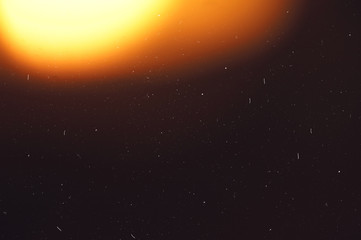 Fototapeta premium Lens Optical Flare Film Dust Overlay Effect Vintage Abstract Bokeh and Light Leaks Photo with Retro Camera Defocused Blur Reflection Bright Sunlights. Use Screen Overlay Mode for Photo Processing.