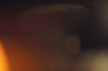 Lens Optical Flare Film Dust Overlay Effect Vintage Abstract Bokeh and Light Leaks Photo with Retro Camera Defocused Blur Reflection Bright Sunlights. Use Screen Overlay Mode for Photo Processing.