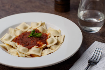 Italian ravioli with tomato sauce