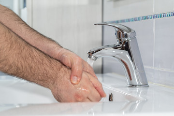 Washing hands rubbing with soap man for corona virus prevention, hygiene to stop spreading coronavirus