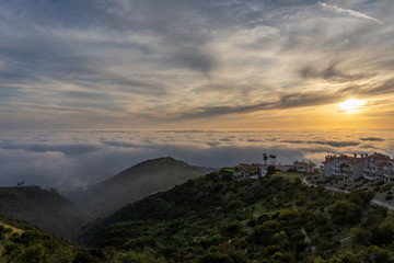 Sunset over the clouds in Laguna Beach California