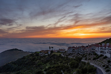 Sunset over the clouds in Laguna Beach California