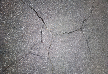 Obraz premium Black & white cracked asphalt background