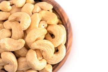 Bowl of Raw Natural Cashews Isolated on a White Background