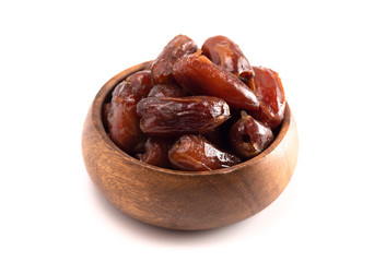 Bowl of Pitted Dates Isolated on a White Background