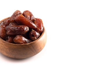 Bowl of Pitted Dates Isolated on a White Background