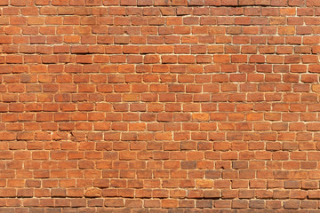 Grunge red brick wall background.