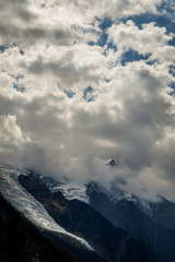 Glacier des Bossons viewed from Chamonix in a cloudy day of september. Mont Blanc Massif, French Alps, Chamonix, Bosson Glacier, France, Europe.